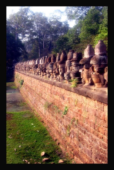 angkorwattfaces IRREPLACABLE...THESE ANCIENT BUDDHA HEADS LITERALLY "DE-FACED"